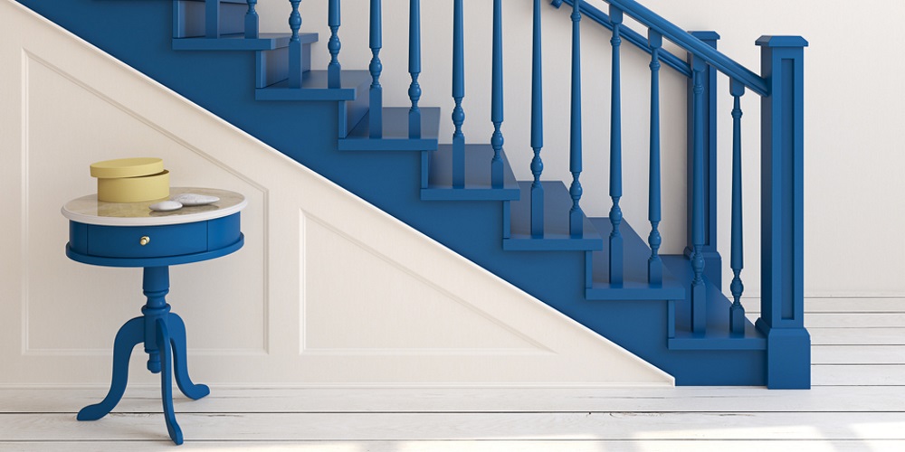 staircase with blue balustrade