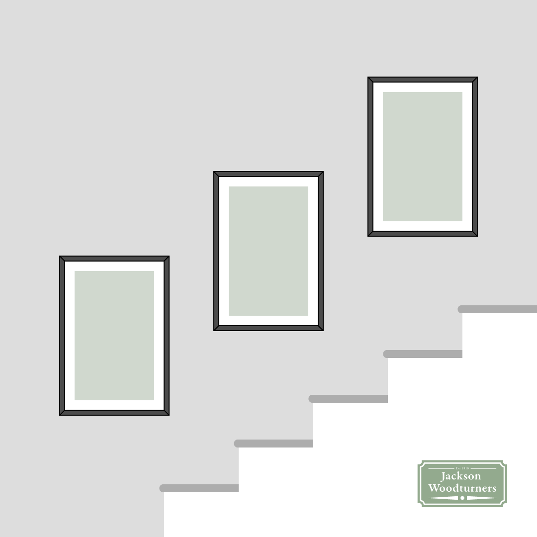 expert-tips-for-creating-a-gallery-wall-above-your-staircase